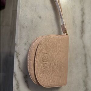 Chic Pink Leather Clutch with Textured Finish